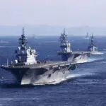 Japan defense chief urges higher security after drone video of warship posted on China social media