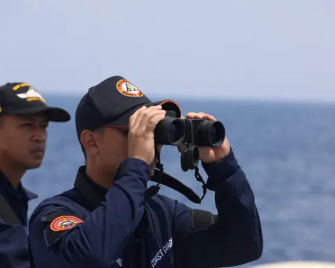 Philippines sends ships to disputed atoll where China building 'artificial island'