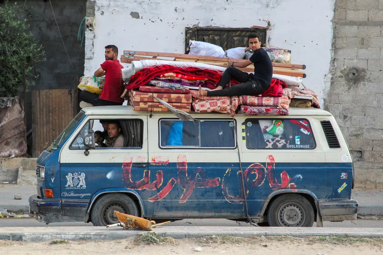 Palestinians flee Rafah after Israeli forces launched a ground and air operation in the eastern part of the southern Gaza city