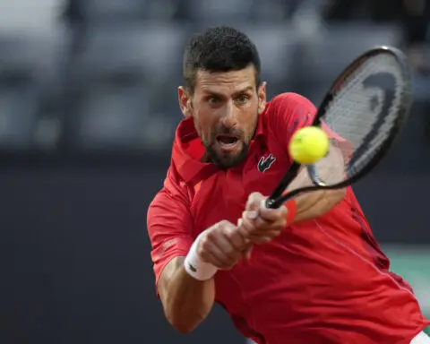 Djokovic wins his opener at the Italian Open after a month off. Defending champ Rybakina withdraws