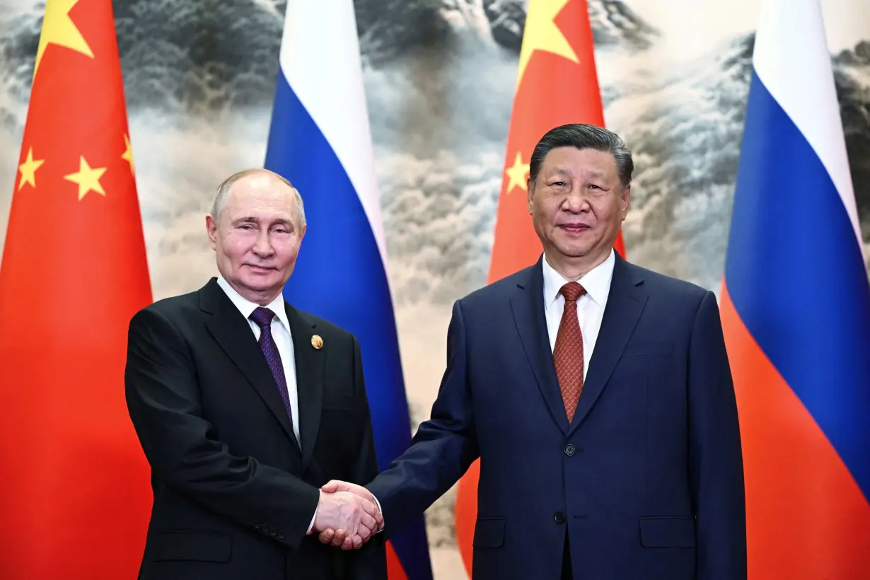 Russian President Vladimir Putin and Chinese President Xi Jinping meet in Beijing