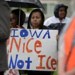 Justice Department warns it plans to sue Iowa over new state immigration law