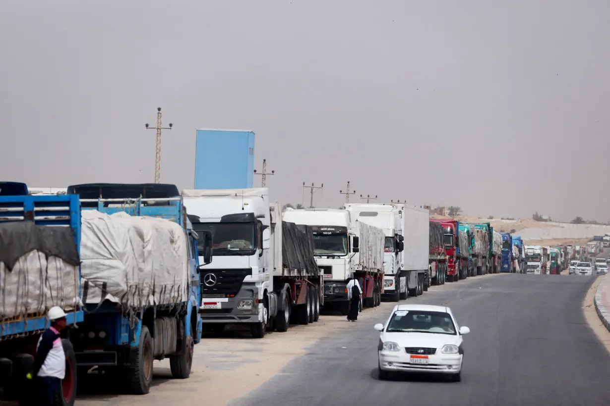 FILE PHOTO: Trucks stand at the Rafah border crossing between Egypt and the Gaza Strip