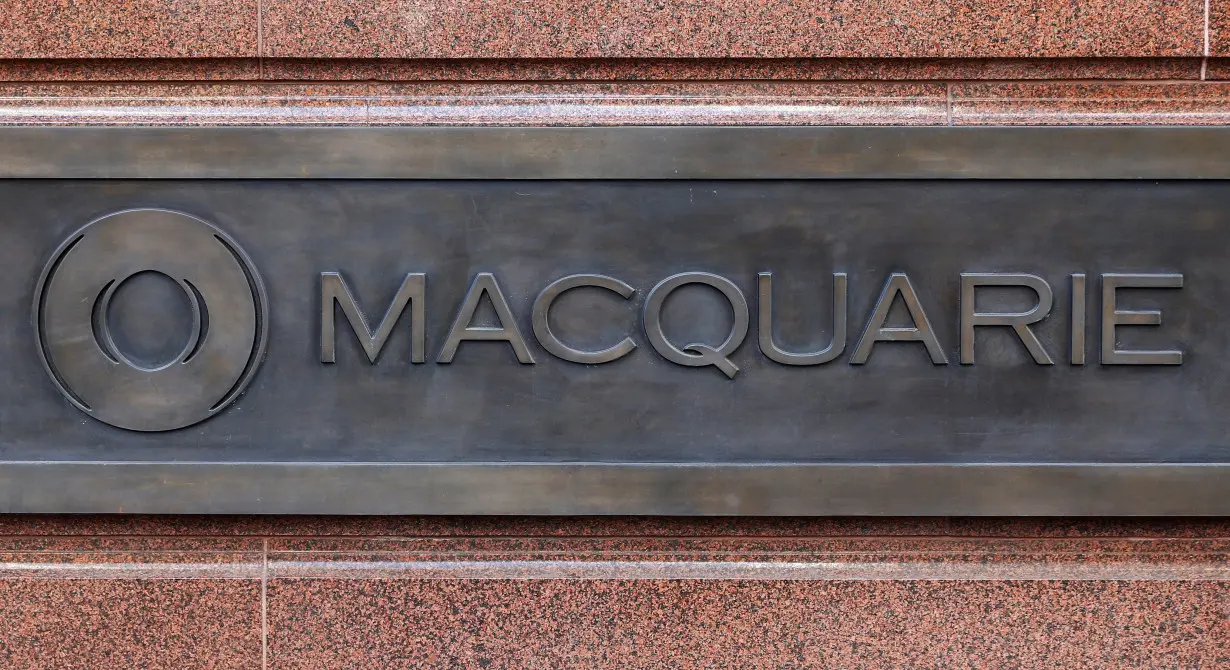 FILE PHOTO: Macquarie Group's logo is pictured on the wall of the Sydney headquarters after the Australian bank's full year results were announced