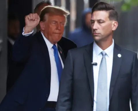 On first day of Trump hush money trial, prosecutors say he corrupted 2016 election