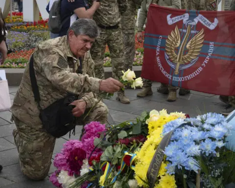 Russian missiles kill 7 in Ukraine's second-largest city as Moscow's troops press offensive