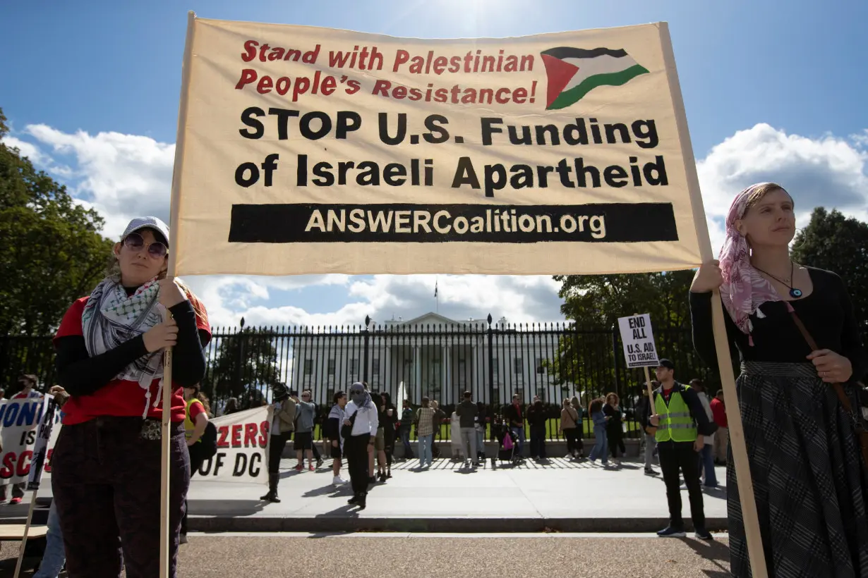 Supporters of the Palestinian people demonstrate outside the White House in Washington