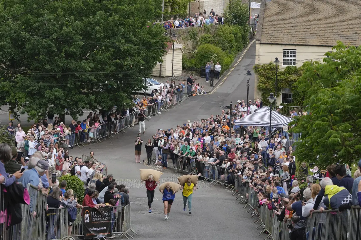 Chasing cheese wheels or lugging sacks of wool, UK competitors embrace quirky extreme races