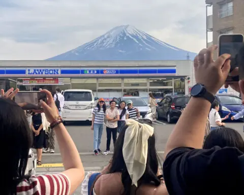 Japan town blocks view of Mt Fuji at photo spot to stop crowds