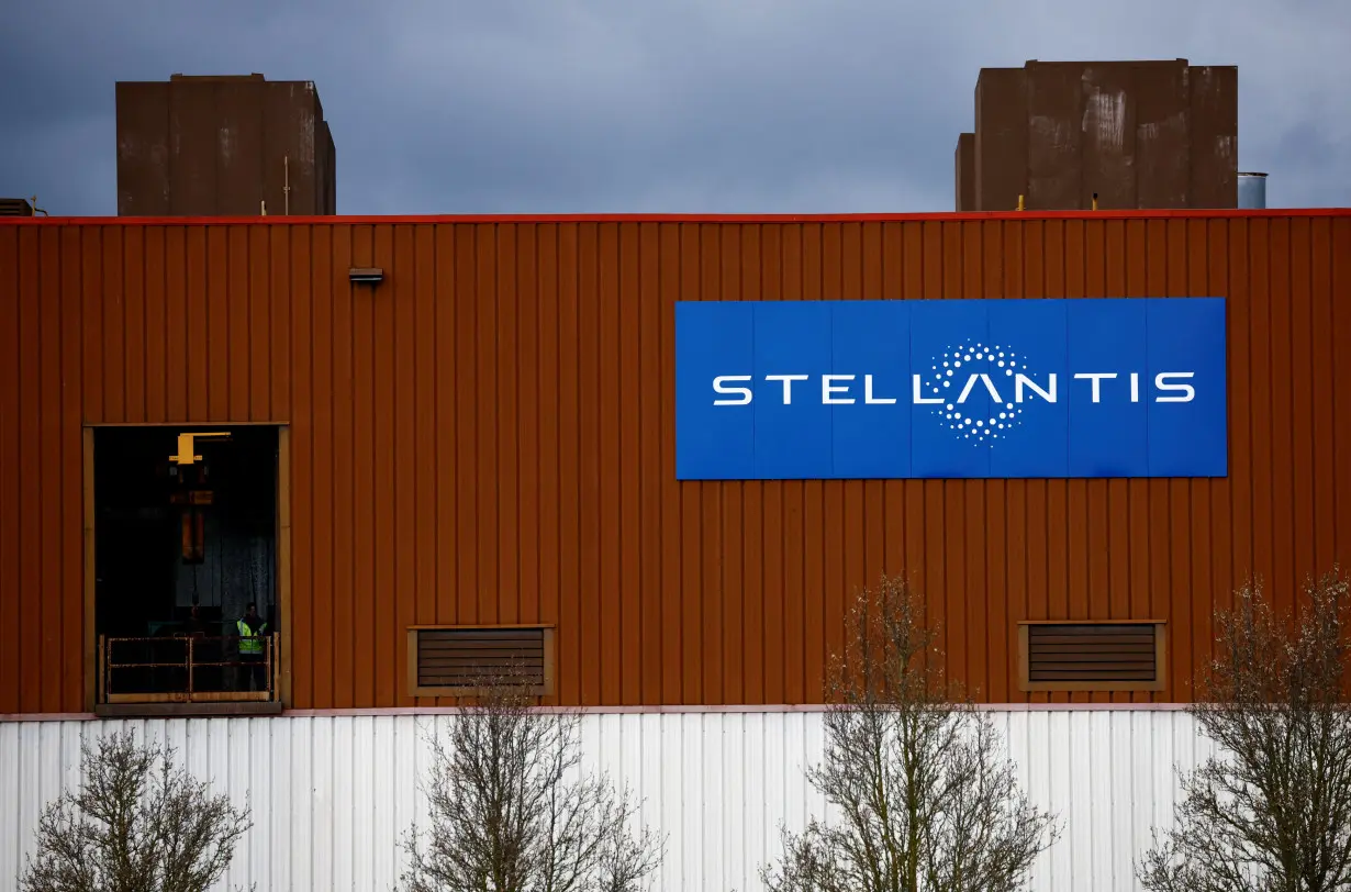 FILE PHOTO: The logo of Stellantis is seen outside a company building in Chartres-de-Bretagne near Rennes