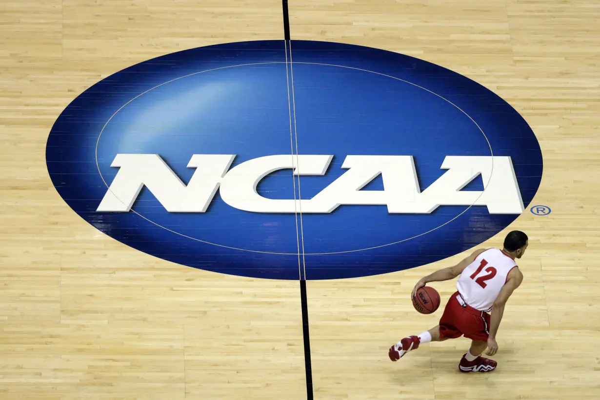 NCAA votes to accept $2.8 billion settlement that could usher in dramatic change for college sports