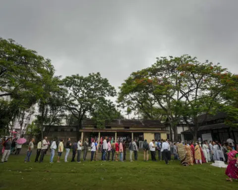 India votes in third phase of national elections as Modi escalates his rhetoric against Muslims