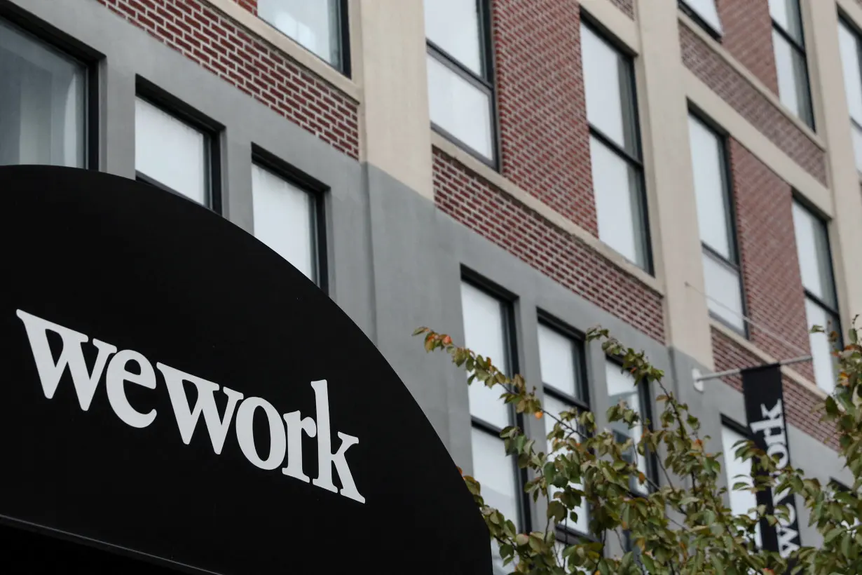 FILE PHOTO: A WeWork logo is seen outside its offices in the Queens borough of New York City