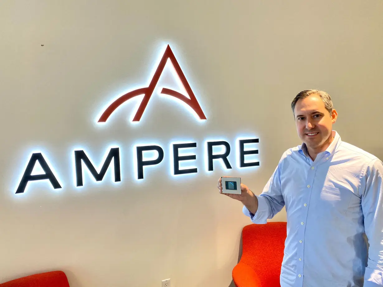 Jeff Wittich, chief product officer of Ampere Computing, holds one of the company’s chips