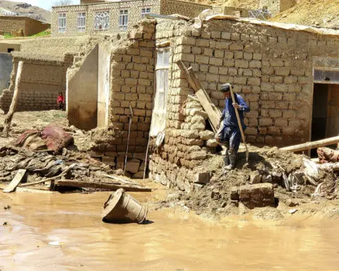 Flash floods due to unusually heavy seasonal rains kill at least 68 people in Afghanistan