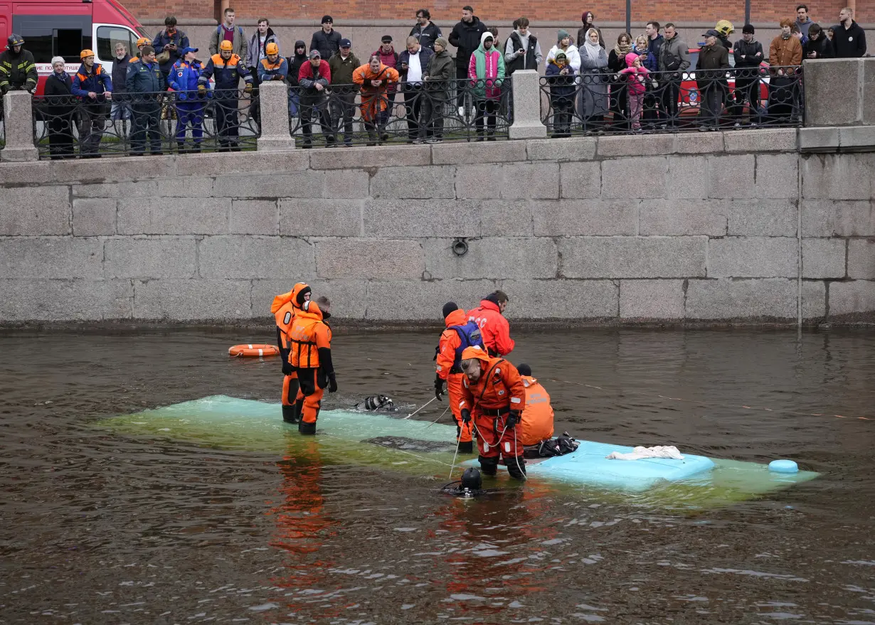 A bus plunges off a bridge in the Russian city of St. Petersburg, killing 7 people