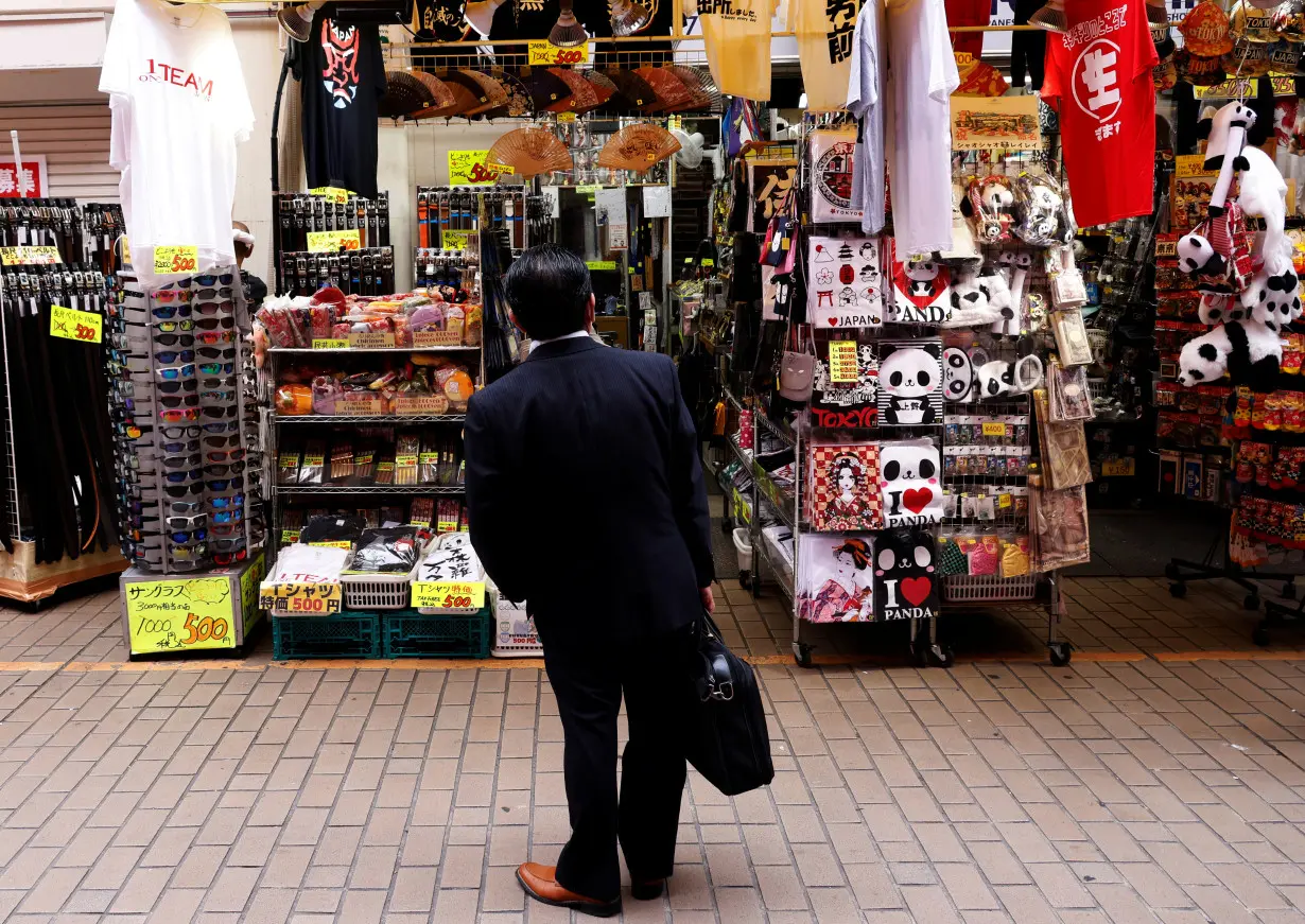 Japan April consumer inflation beats BOJ target for 1st time in 7 years