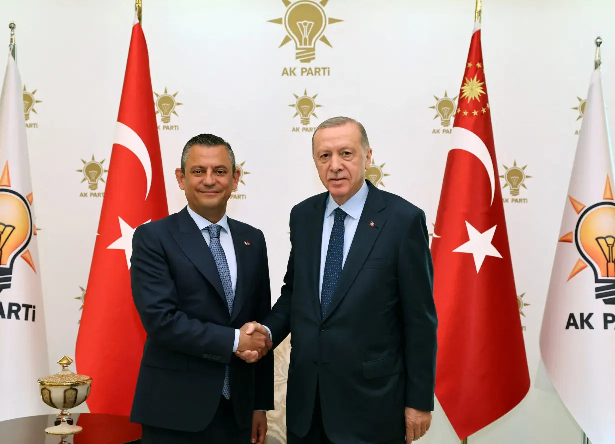 FILE PHOTO: Turkey's President Tayyip Erdogan meets with Turkey's main opposition Republican People's Party leader Ozgur Ozel in Ankara