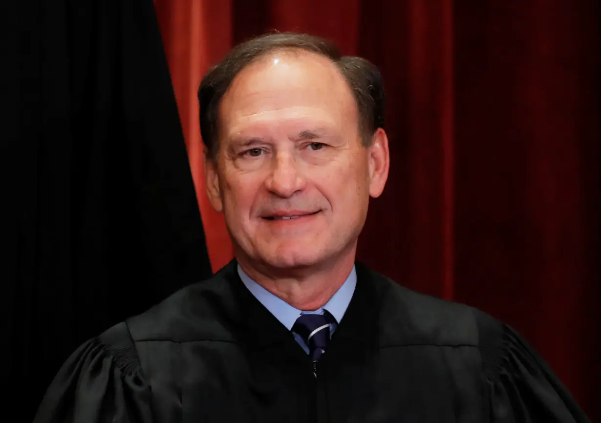 U.S. Supreme Court Justice Samuel Alito, Jr poses during group portrait at Supreme Court in Washington