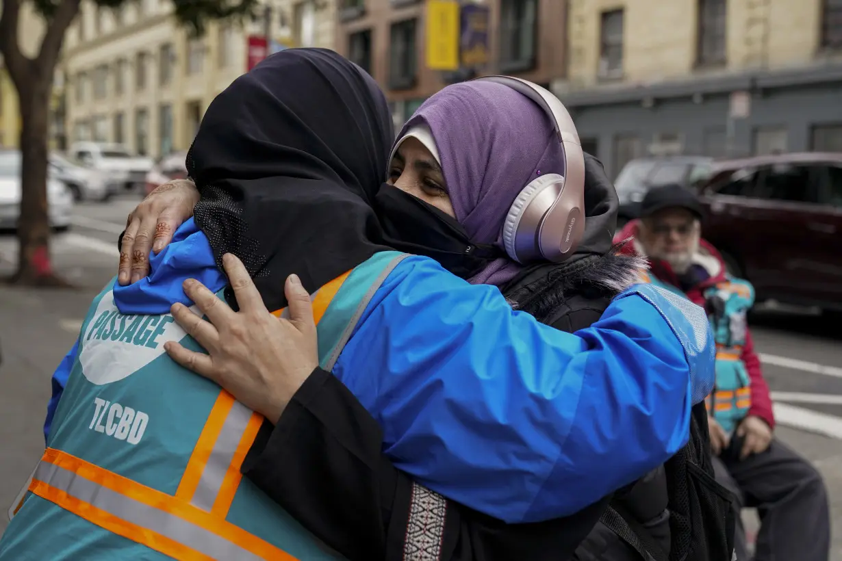 With a vest and a voice, helpers escort kids through San Francisco’s broken Tenderloin streets