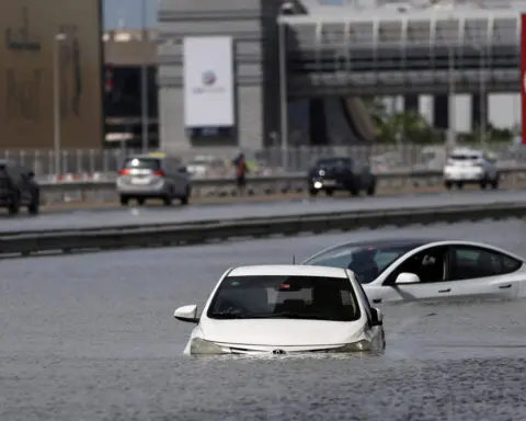 What caused the storm that brought Dubai to a standstill?
