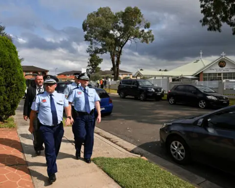 Teen charged with terrorism over Sydney bishop stabbing