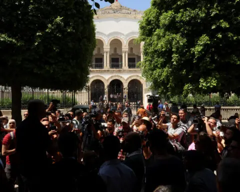 Tunisia sentences two journalists to one year in prison
