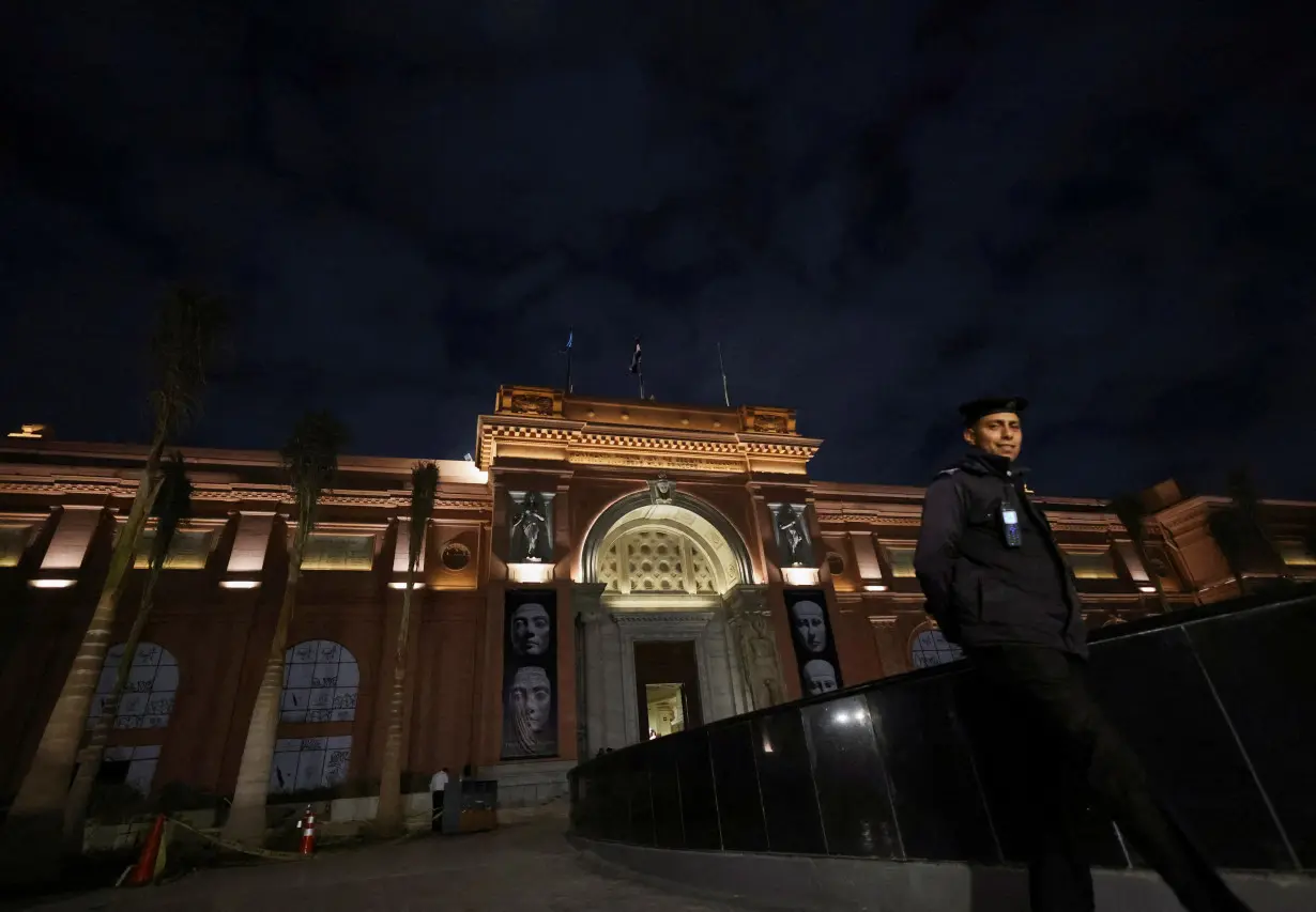 FILE PHOTO: A police officer walks next to an entrance of the Egyptian Museum in Egypt's capital of Cairo