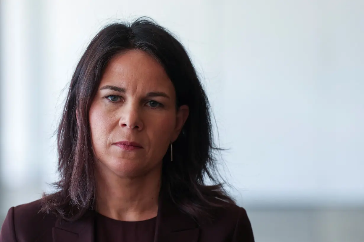 German Foreign Minister Annalena Baerbock delivers a statement at Ben Gurion International Airport in Lod