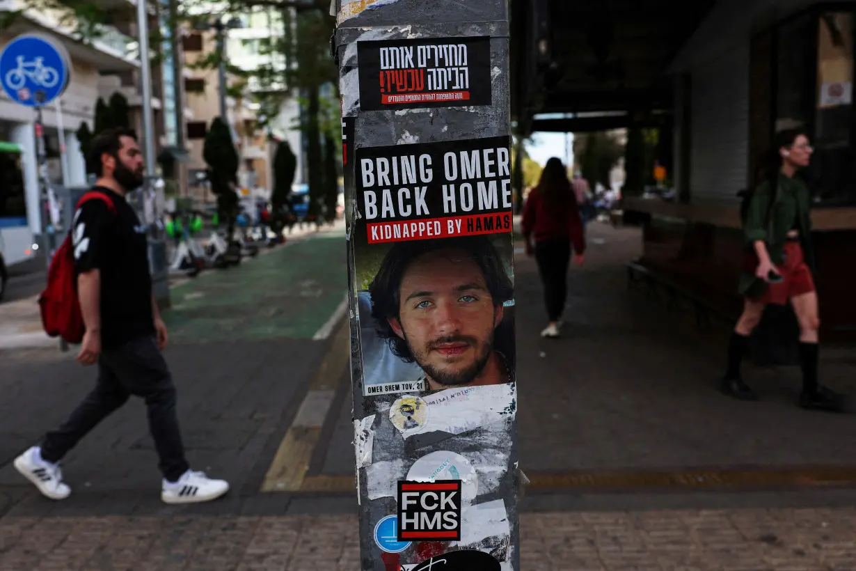 Posters of hostages kidnapped during the deadly October 7 attack by Palestinian Islamist group Hamas from Gaza, in Tel Aviv