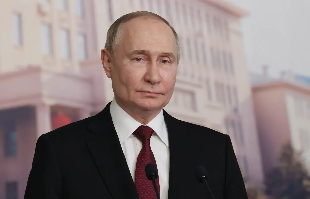 Russian President Putin attends press conference in Harbin