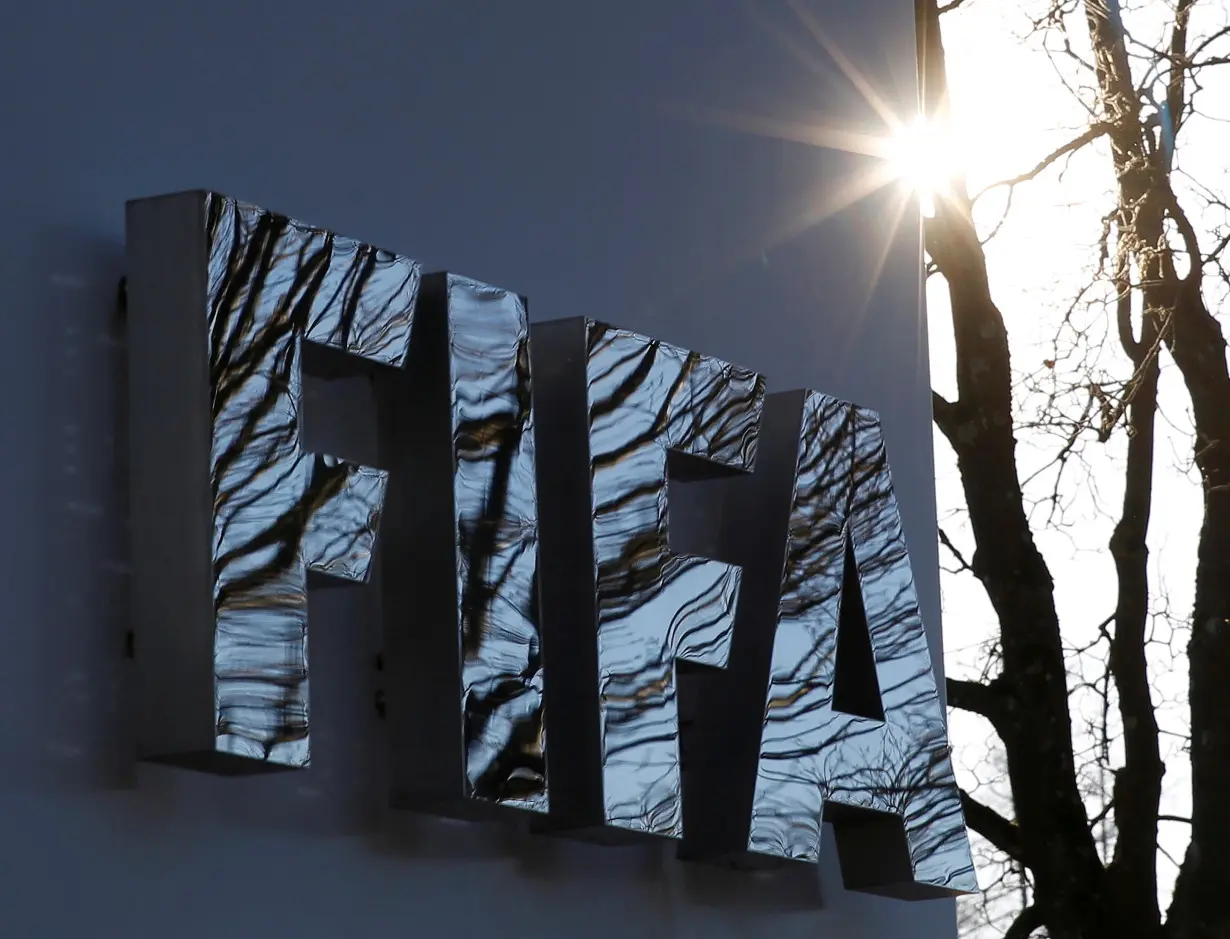 FILE PHOTO: The FIFA logo is seen outside the FIFA headquarters in Zurich