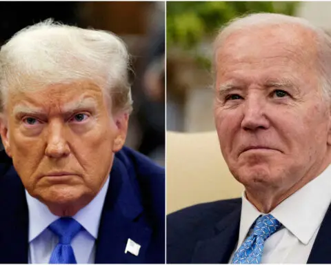 Dow tops 40,000, Biden trolls Trump in split-screen video