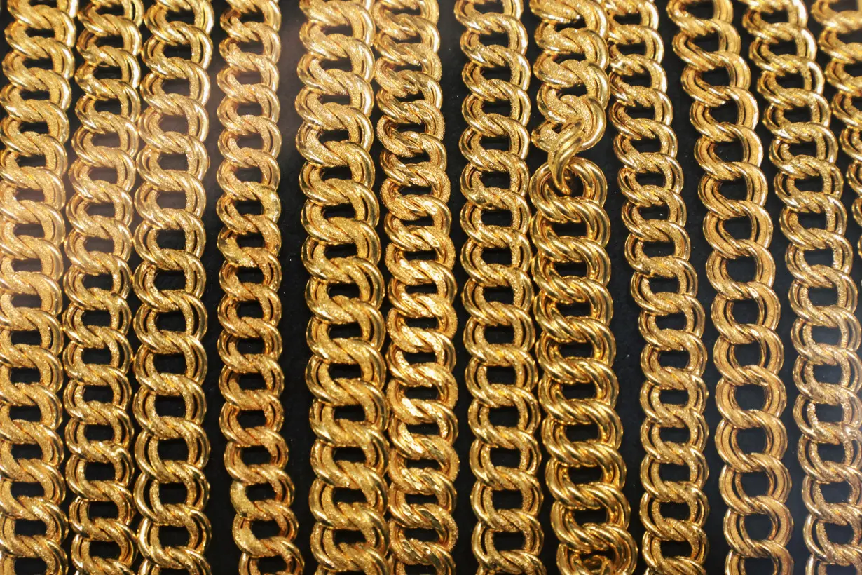 Gold chains are displayed at VJ Gold and Diamond jewellery shop in Kuala Lumpur