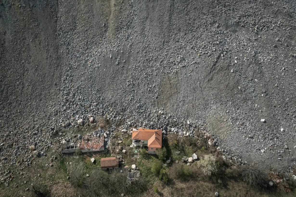 The Wider Image: In Serbian village, women fight to escape encroaching mine