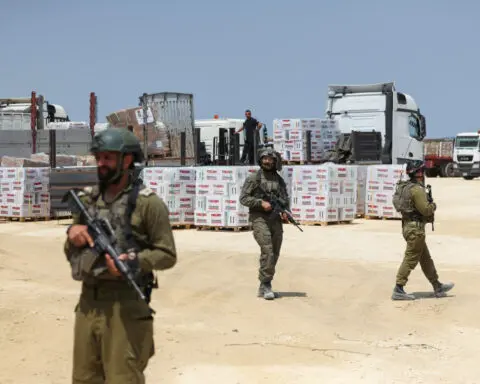 Israel allows trucks from newly reopened Erez crossing into Gaza after U.S. pressure