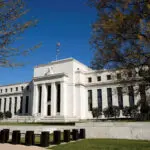 Fed's communications style scores well with analysts but not public