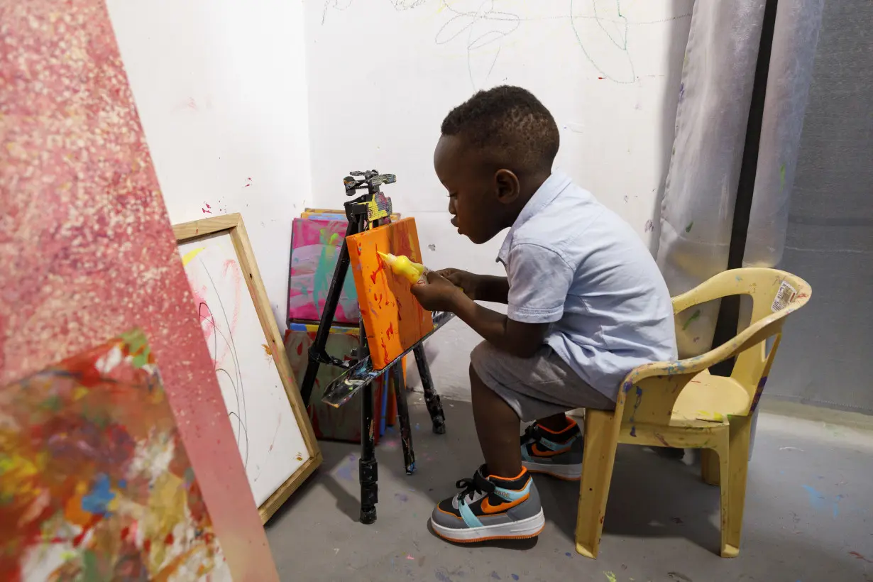 A Ghana toddler sets a world record as the youngest male artist. His mom says he just loves colors