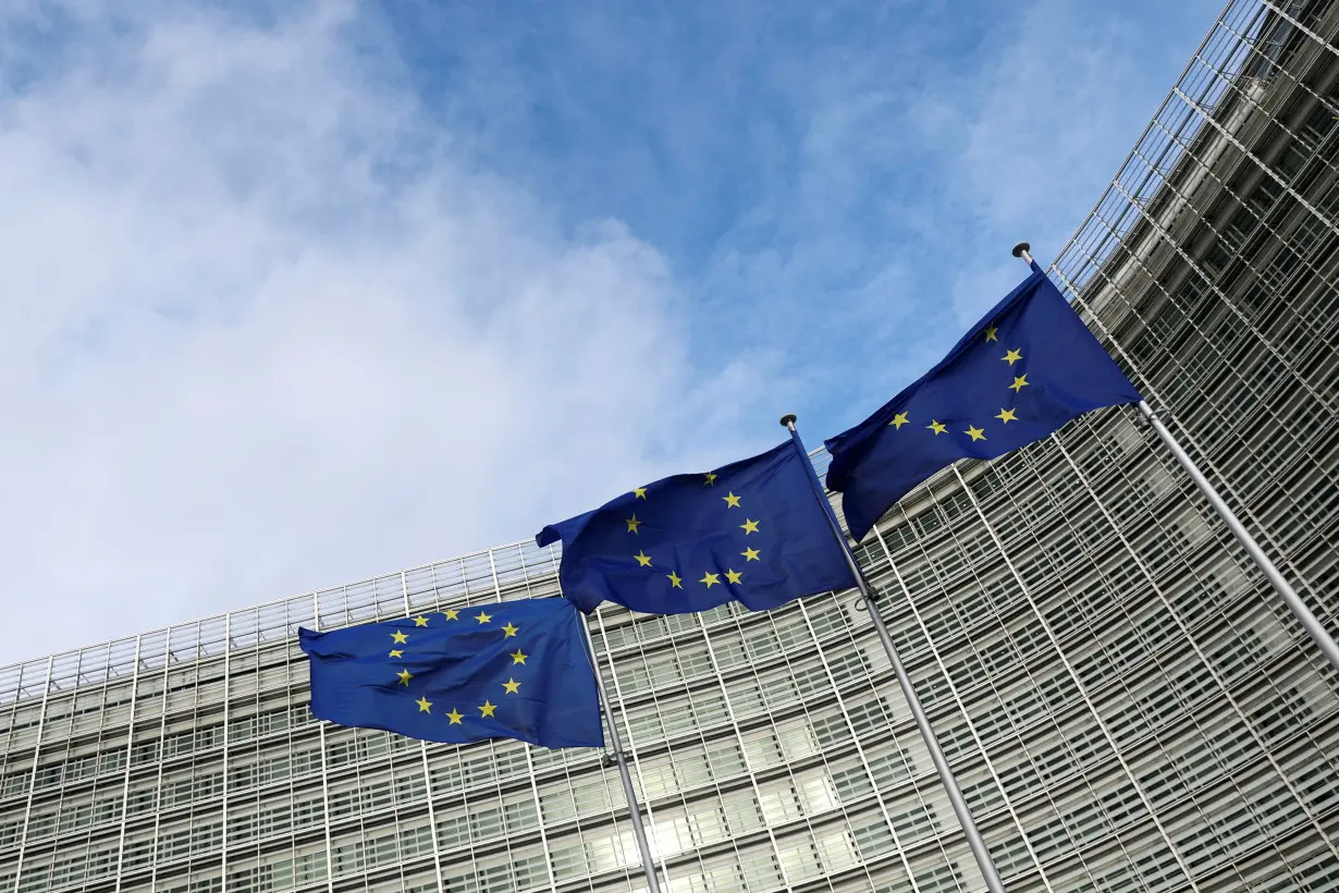 EU flags fly outside the European Commission in Brussels