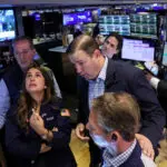 Stocks and bonds wobble as global economy throws off mixed signals