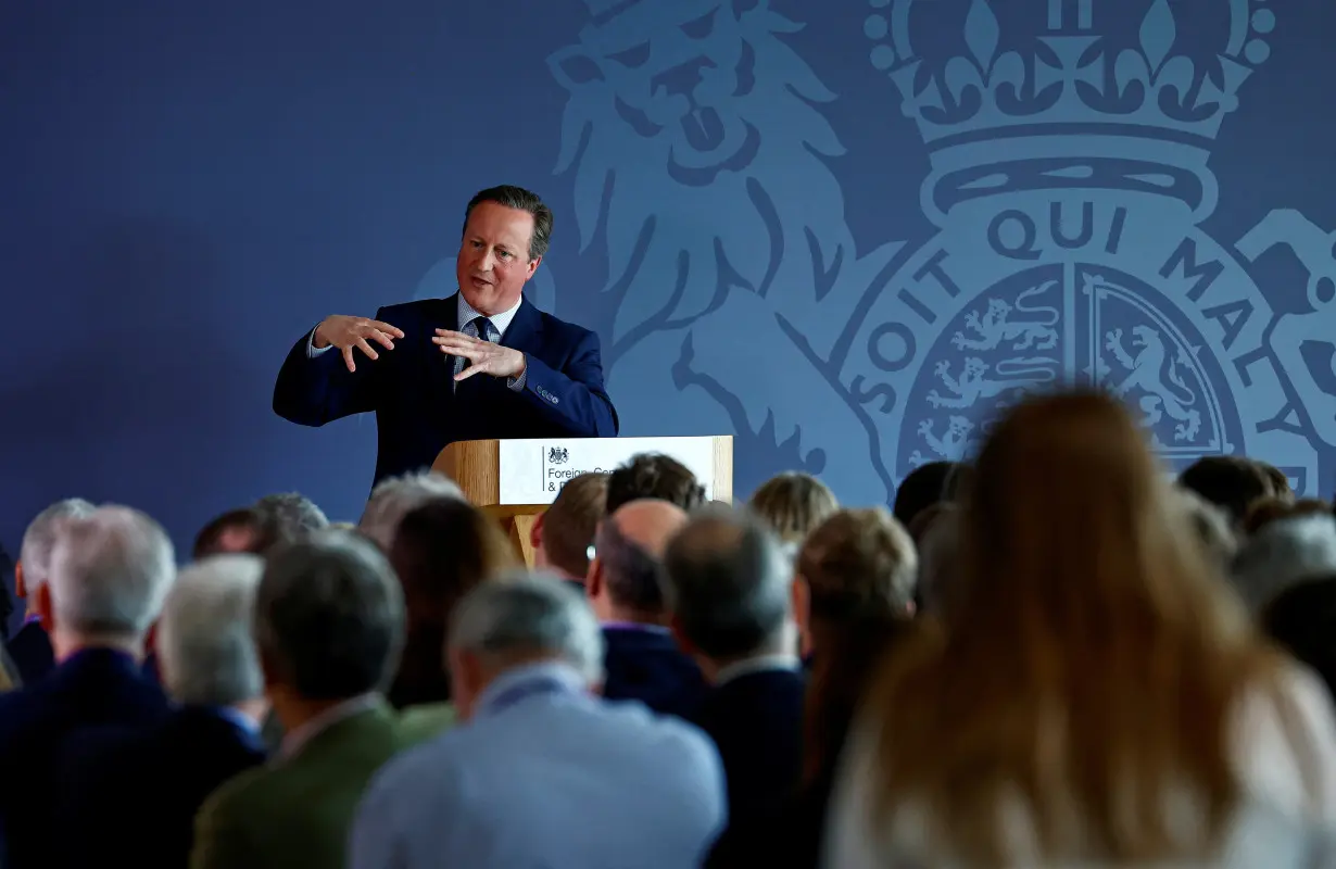 In 'dangerous world', UK's Cameron says NATO must be tougher, spend more