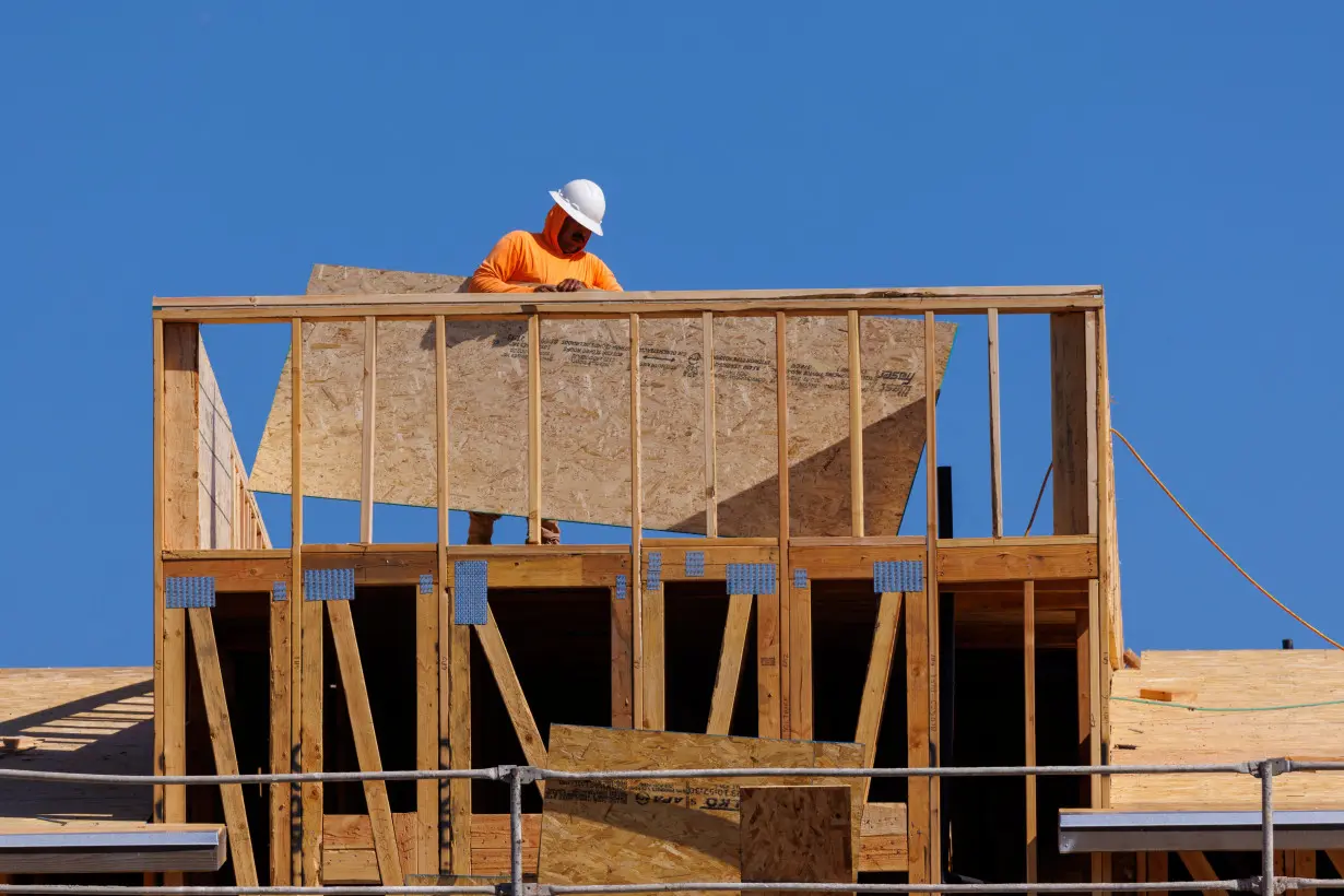 FILE PHOTO: New contemporary attached residential homes are shown under construction in California