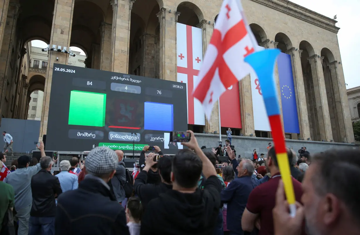 Protests in Tbilisi as parliament overcomes presidential veto on 'foreign agents' law