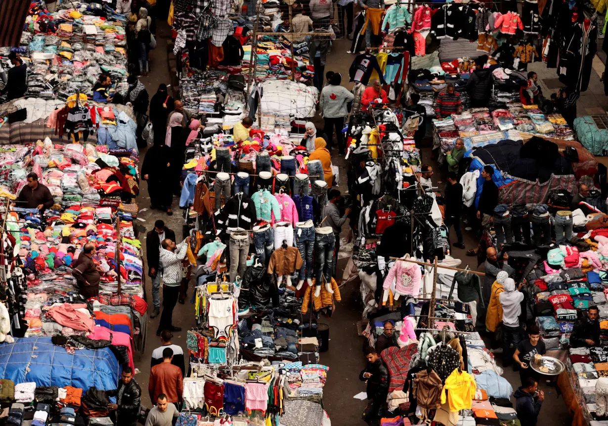 People shop at Al Ataba, a popular market in downtown Cairo