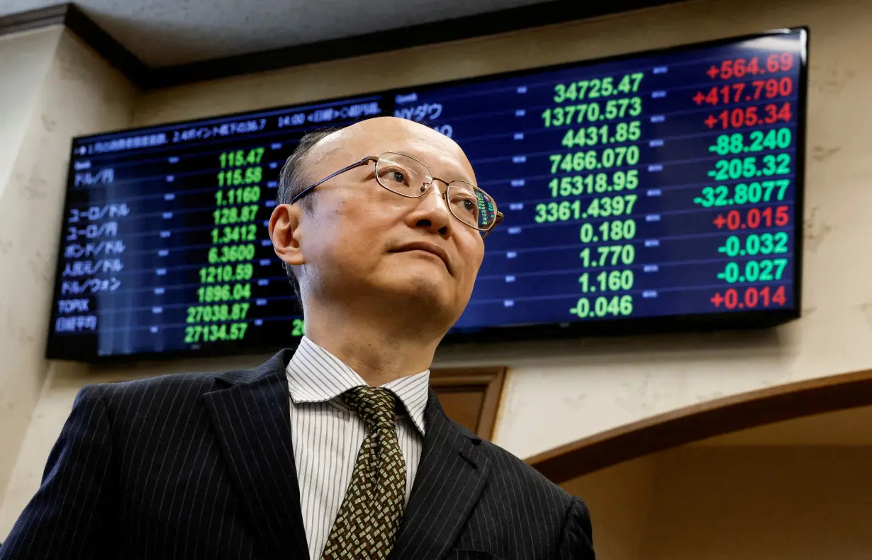 FILE PHOTO: Japan's vice minister of finance for international affairs, Masato Kanda, poses for a photograph during an interview with Reuters at the Finance Ministry in Tokyo