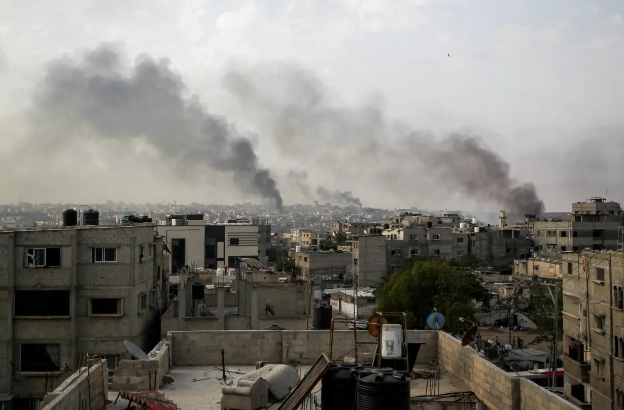 Smoke rises following Israeli strikes during an Israeli military operation, in Rafah