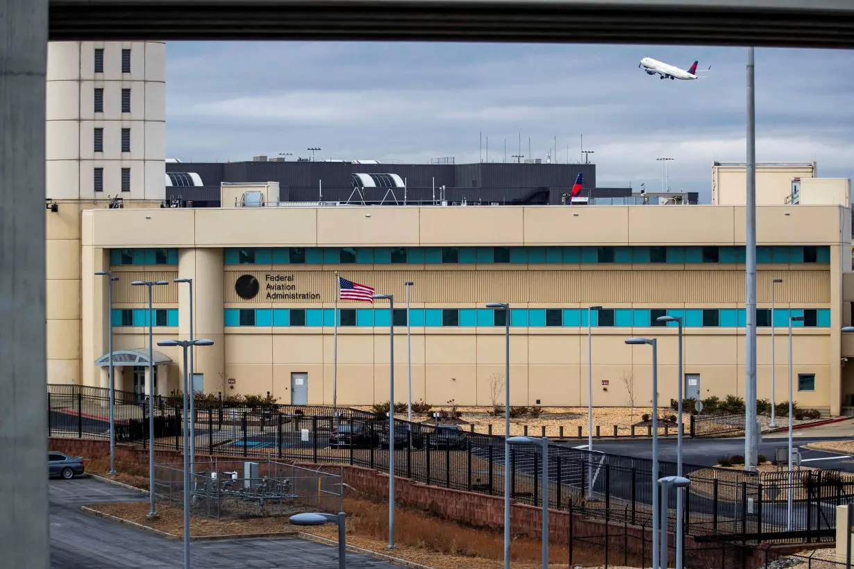 Passengers wait for the flights to resume at Hartsfield-Jackson Atlanta International Airport in Atlanta