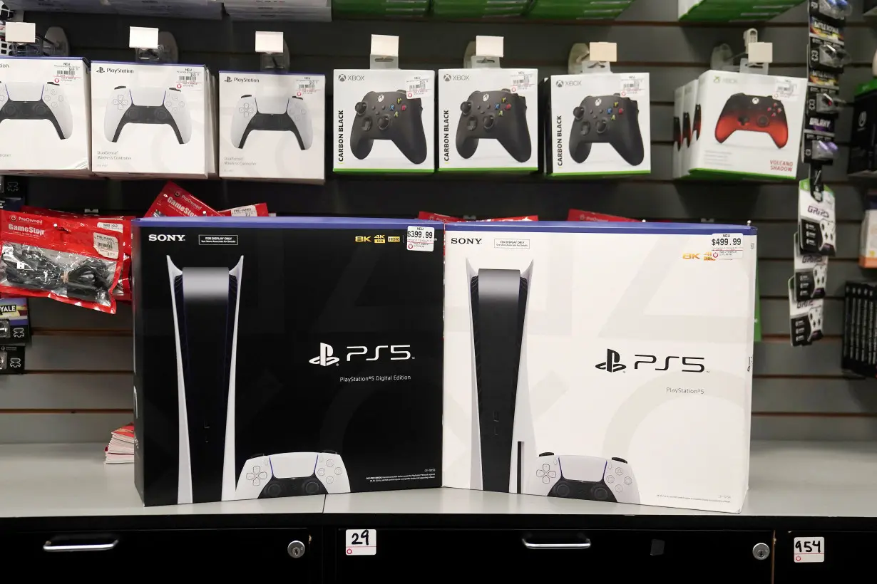 FILE PHOTO: Inside a GameStop store Sony PS5 gaming consoles are pictured