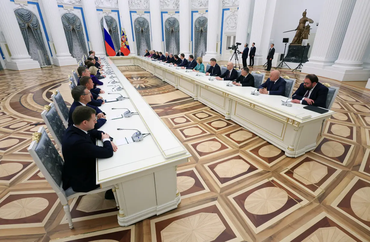 Russian President Putin chairs a meeting with members of the new government in Moscow