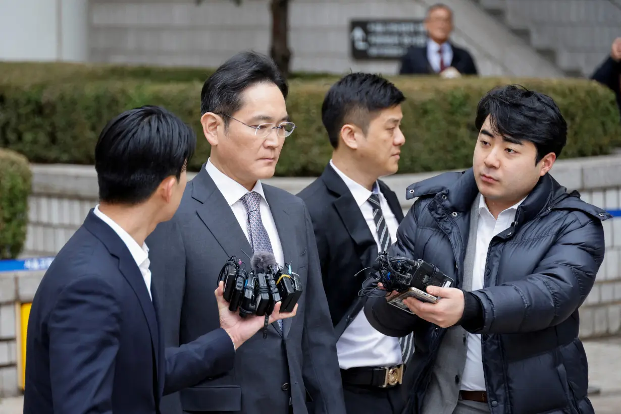 FILE PHOTO: Samsung Electronics Chairman Jay Y. Lee leaves at a court in Seoul